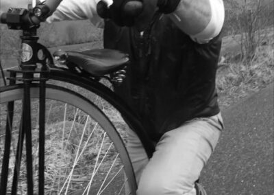 Tom Clowes on his Penny Farthing