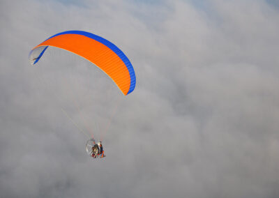 Tom Clowes paramotoring in the clouds