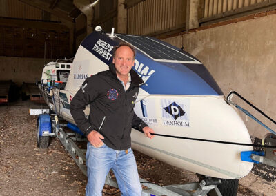 Tom Clowes with his ocean rowing boat